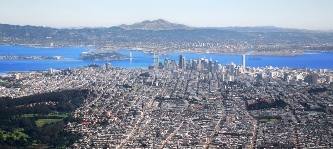 Jitze Couperus San Francisco zoomed out a bit  Moving south, we can see the city with Park Presidio (tree-lined green strip along the bottom) connecting Golden Gate Park (which is still off to the right of this picture) with The Presidio which is the green area to the left. )